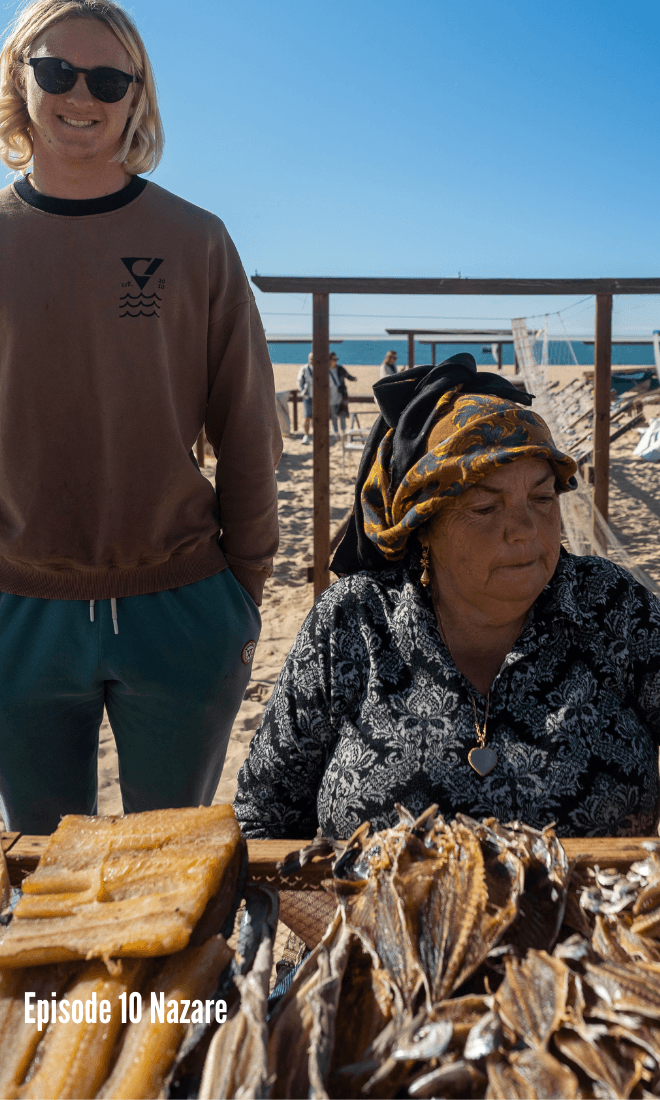 london standing next to nazare fisherwoman