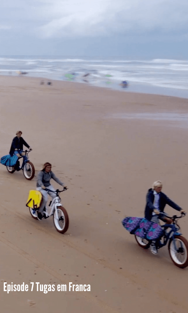 london, micah and vincent riding ebikes on beach in france